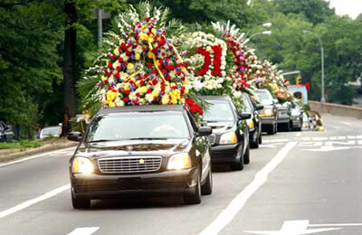 Funeral car and flowers